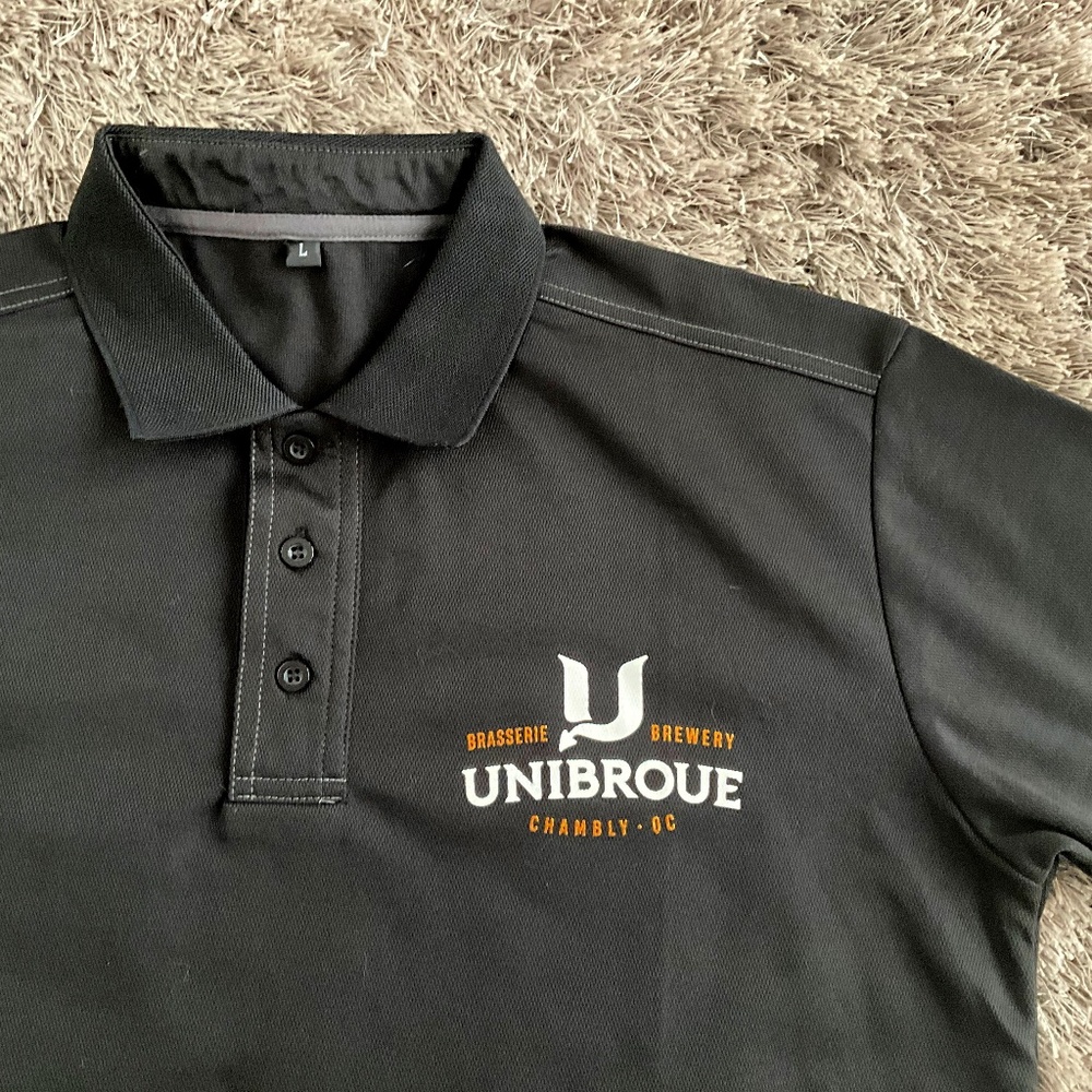 NEW Unibroue Brewery, (Unibrow) Chambay Quebec Canada Polo Shirt. Bar Beer Shirt